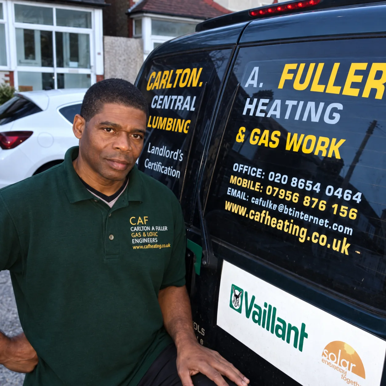 Carlton Fuller beside the CAF Heating van