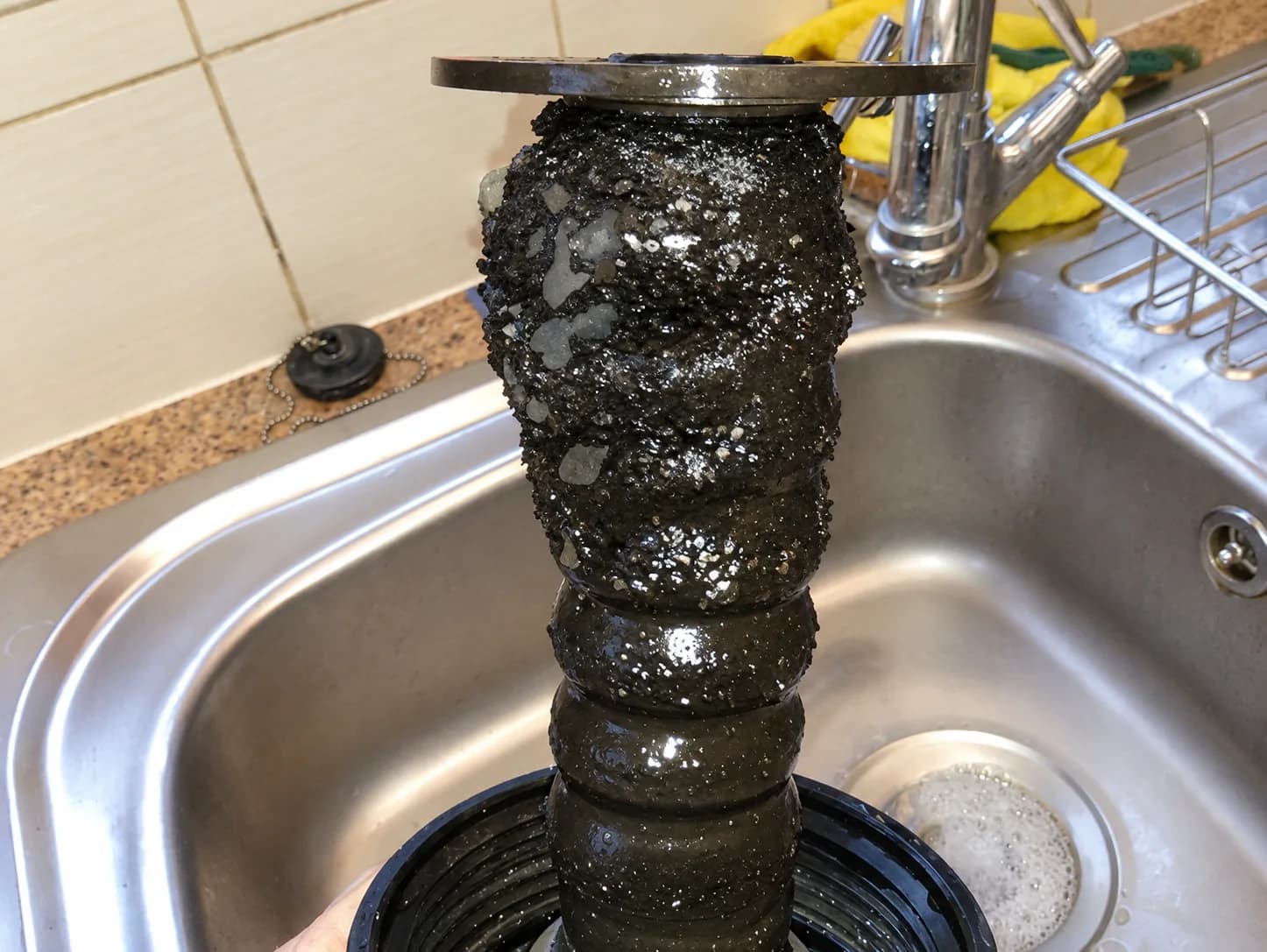 Black sludge and scale built up on a heating system filter removed by CAF Heating